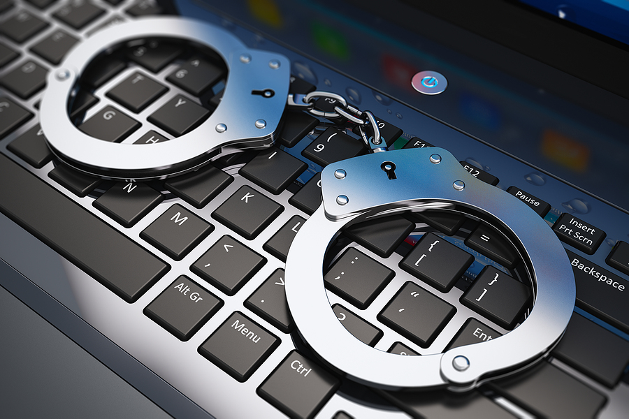 Handcuffs on laptop