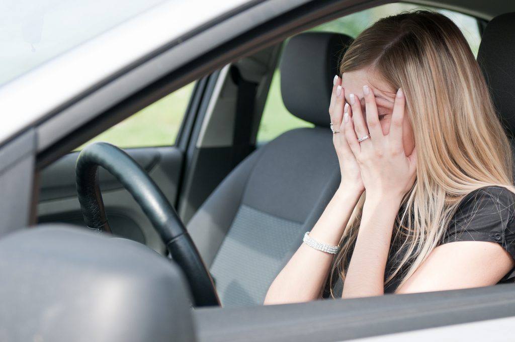 Unhappy Woman In Car